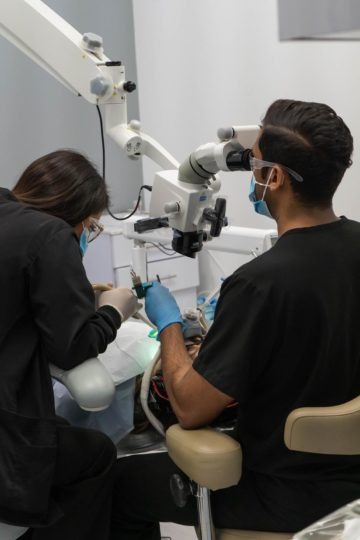 Contemporary Endodontics | Dr. Reddy with Microscope